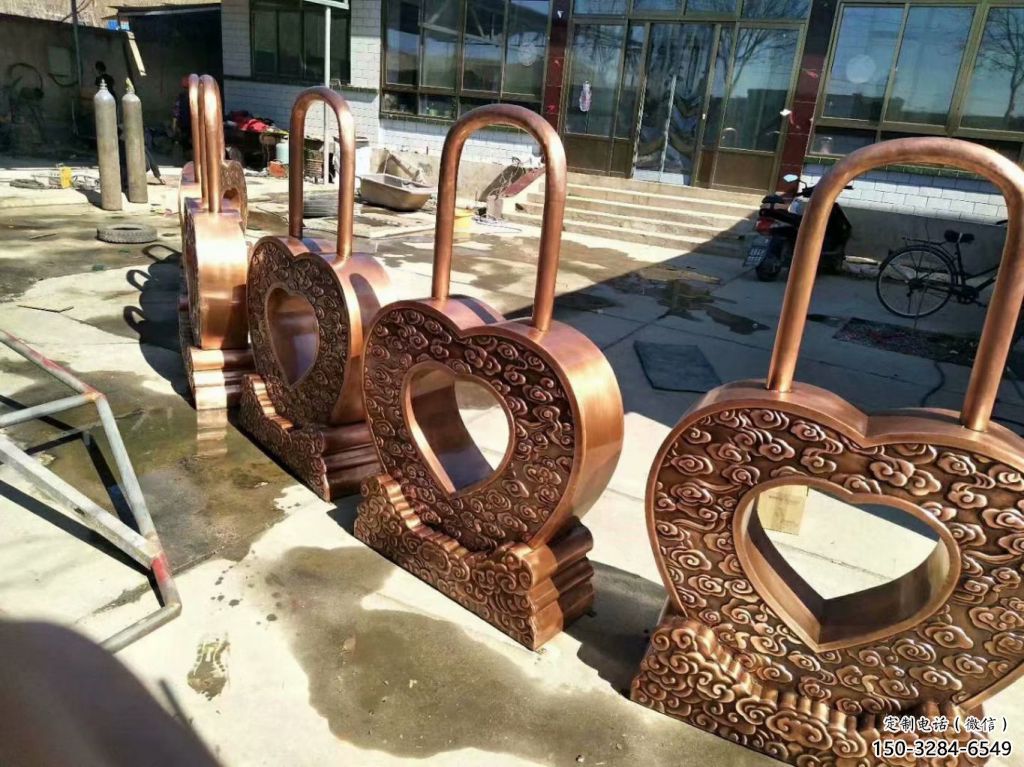 別墅區(qū)鎖子雕塑 大型別墅區(qū)雕塑 剪影同心鎖雕塑