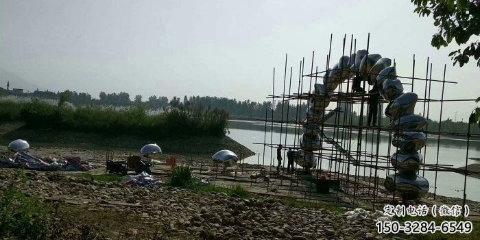 鵝卵石大門雕塑，公園美陳雕塑，不銹鋼鏡面拱門雕塑