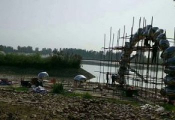 鵝卵石大門(mén)雕塑，公園美陳雕塑，不銹鋼鏡面拱門(mén)雕塑