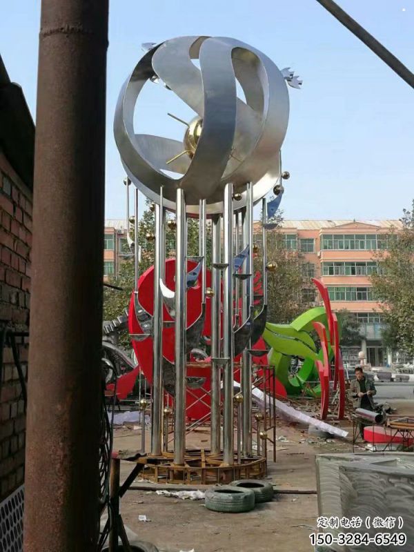 地球儀雕塑定制，小區(qū)雕塑，不銹鋼手托地球儀雕塑廠家