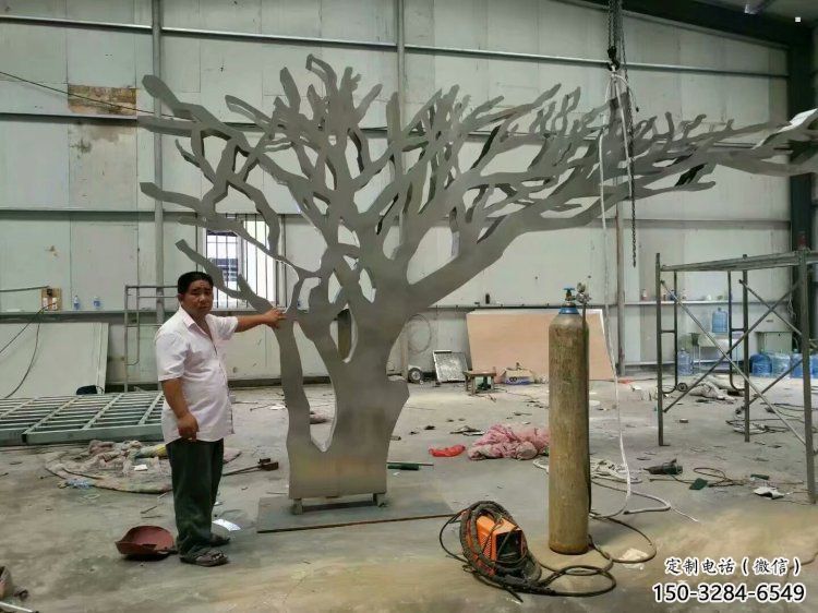 抽象鏤空樹(shù)雕塑，小區(qū)雕塑，鏤空剪紙樹(shù)雕塑廠家