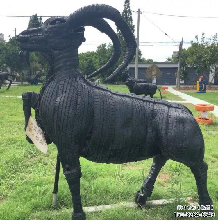 澄邁輪胎山羊雕塑供應(yīng)，公園雕塑，鑄銅輪胎羊雕塑供求